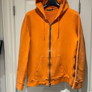 Balmain Authentic Men’s Orange Cotton zip up Hoodie with large zipper details.